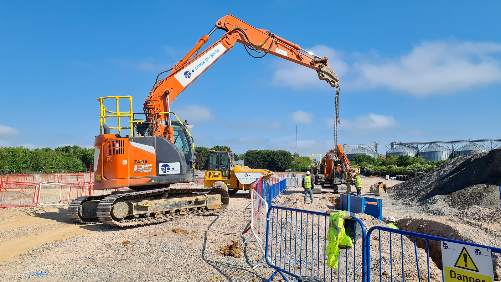 Entex projects excavator working on a construction site