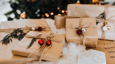 wrapped gifts under Christmas tree present