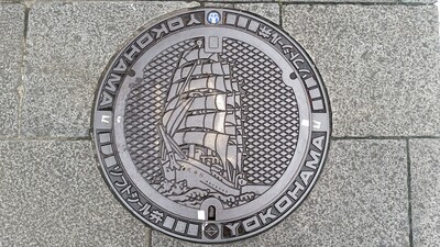 beautiful manhole cover with artistic ship pattern