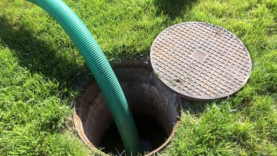 septic tank clearance and emptying through a manhole cover